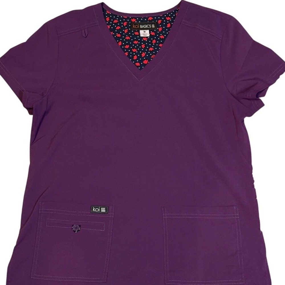 Koi Lite women's scrub topโ medium purple.